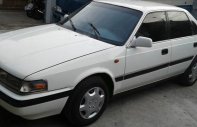Mazda 323 1990 - Cần bán lại xe Mazda 323 1990, màu trắng, nhập khẩu chính hãng giá 66 triệu tại Tp.HCM