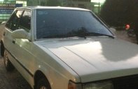 Mitsubishi Lancer 1988 - Cần bán xe Mitsubishi Lancer đời 1988, màu trắng giá 32 triệu tại Kiên Giang