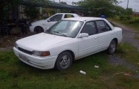 Mazda 323 1995 - Cần bán xe Mazda 323 đời 1995, màu trắng xe gia đình, giá tốt giá 91 triệu tại Long An