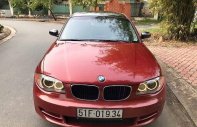 BMW 1 Series 128i 2010 - Cần bán gấp BMW 128i đời 2010, màu đỏ xe gia đình giá cạnh tranh giá 610 triệu tại Tp.HCM
