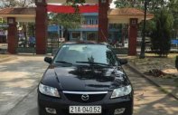 Mazda 323   2001 - Bán xe cũ Mazda 323 sản xuất 2001, màu đen, giá tốt giá 195 triệu tại Yên Bái