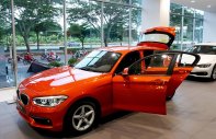 BMW 1 Series 118i 2017 - BMW 1 Series 118i 2017, màu cam. BMW Đà Nẵng bán xe BMW 118i nhập khẩu chính hãng, giá rẻ nhất giá 1 tỷ 328 tr tại Bình Định