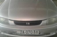 Mazda 323  MT 1999 - Bán Mazda 323 MT đời 1999, màu bạc số sàn giá 120 triệu tại Long An