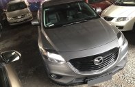 Mazda CX 9 2.5 2016 - Cần bán xe Mazda CX9 2016 số tự động, màu xám bạc giá 1 tỷ 390 tr tại Tp.HCM