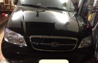 Kia Carnival GS 2006 - Gia đình cần bán xe Kia Carnival GS 2006 màu đen giá 260 triệu tại Tp.HCM