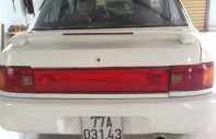 Mazda 323   1996 - Bán ô tô Mazda 323 đời 1996, màu trắng giá 55 triệu tại Kon Tum