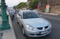 Mitsubishi Lancer 2006 - Cần bán xe Mitsubishi Lancer năm 2006, màu bạc, xe gia đình sử dụng còn mới giá 275 triệu tại Tp.HCM