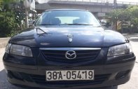 Mazda 626   2001 - Bán ô tô Mazda 626 đời 2001, màu đen chính chủ giá 142 triệu tại Ninh Bình