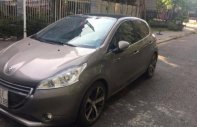 Peugeot 208 2014 - Cần bán lại xe Peugeot 208 đời 2014, màu nâu giá 500 triệu tại Tp.HCM