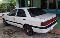 Mazda 323 1995 - Cần bán lại xe Mazda 323 đời 1995, màu trắng, xe nhập, giá 72tr giá 72 triệu tại An Giang