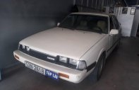 Mazda 323 1992 - Bán Mazda 323 đời 1992, màu trắng giá 40 triệu tại Hậu Giang