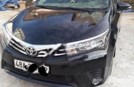 Toyota Corolla altis 2014 - Cần bán gấp Toyota Corolla altis đời 2014, màu đen chính chủ giá 590 triệu tại Đắk Nông