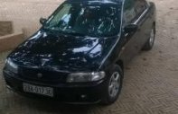 Mazda 323 1998 - Cần bán gấp Mazda 323 sản xuất 1998, màu đen, 125tr giá 125 triệu tại Sơn La