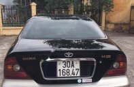Daewoo Magnus 2004 - Cần bán lại xe Daewoo Magnus đời 2004, màu đen xe gia đình giá 175 triệu tại Nam Định