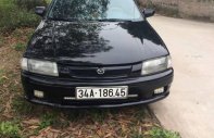 Mazda 323 MT 2000 - Bán Mazda 323 MT đời 2000, màu đen, xe nhập số sàn, 115 triệu giá 115 triệu tại Hải Dương