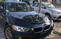 BMW 3 Series 320i  2014 - Cần bán xe BMW 3 Series 320i sản xuất năm 2014, màu đen, nhập khẩu nguyên chiếc giá 1 tỷ 70 tr tại Kiên Giang