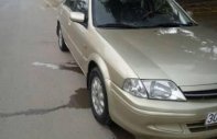 Ford Laser 2001 - Bán Ford Laser sản xuất 2001, màu vàng giá 145 triệu tại Hòa Bình