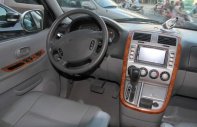 Kia Carnival GS 2009 - Cần bán gấp Kia Carnival GS 2009, màu bạc, giá chỉ 355 triệu giá 355 triệu tại Tp.HCM