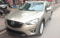 Mazda CX 5 2WD 2013 - Cần bán xe Mazda CX-5, sản xuất và đăng ký 2013 mầu vàng cát. Giá 665 triệu giá 665 triệu tại Hà Nội