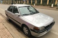 Mazda 323   1995 - Cần bán Mazda 323 đời 1995, màu bạc giá 65 triệu tại Bình Phước