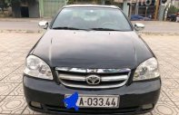 Daewoo Lacetti MT 2007 - Cần bán Daewoo Lacetti MT sản xuất năm 2007, màu đen giá 220 triệu tại Tiền Giang