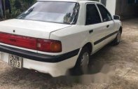 Mazda 323 1996 - Bán Mazda 323 sản xuất năm 1996, màu trắng  giá 45 triệu tại Bình Phước