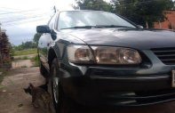 Toyota Camry GLi 1998 - Bán Toyota Camry GLi sản xuất năm 1998, màu xanh lá giá 250 triệu tại Long An