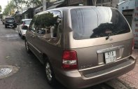 Kia Carnival 2009 - Cần bán lại xe Kia Carnival 2009, màu nâu giá 275 triệu tại Đắk Lắk