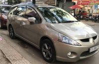 Mitsubishi Grandis AT 2008 - Cần bán gấp Mitsubishi Grandis AT đời 2008, màu vàng, xe đẹp không lỗi nhỏ giá 425 triệu tại Tp.HCM