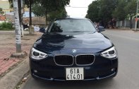 BMW 1 Series 116i 2014 - Cần bán BMW 1 Series 116i sản xuất 2014, màu xanh lam, xe nhập giá 885 triệu tại Bình Dương
