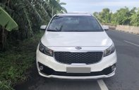 Kia Sedona GAT 2015 - Bán Kia Sedona 2015 màu trắng, số tự động, bản nhập Hàn Quốc giá 990 triệu tại Tp.HCM