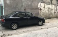 Mazda 323   1999 - Bán xe Mazda 323 đời 1999, màu đen xe gia đình giá 120 triệu tại Lào Cai