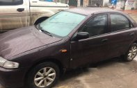 Mazda 323 2000 - Bán xe Mazda 323 đời 2000, xe nhập khẩu, màu nâu tím, máy còn nguyên bản giá 145 triệu tại Quảng Ninh