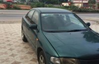 Mazda 323 G 2000 - Cần bán xe Mazda 323 G 2000, màu xanh lá, giá 92 tr giá 92 triệu tại Bình Định