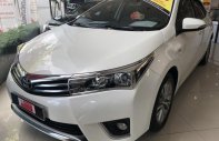Toyota Corolla altis G 2015 - Bán ô tô Toyota Corolla Altis G sản xuất năm 2015, màu trắng, giá tốt giá 699 triệu tại Tp.HCM