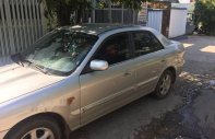 Mazda 626 2002 - Gia đình bán xe Mazda 626 sản xuất 2002, màu bạc   giá 165 triệu tại Kon Tum