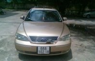 Ford Mondeo 2004 - Cần bán lại xe Ford Mondeo năm 2004, màu vàng, giá rẻ giá 180 triệu tại Kiên Giang