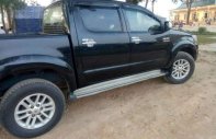 Toyota Hilux MT 2012 - Cần bán gấp Toyota Hilux MT đời 2012, màu đen, nhập khẩu nguyên chiếc giá 475 triệu tại Nghệ An