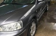 Ford Laser   Ghia  2002 - Cần bán lại xe Ford Laser Ghia đời 2002, màu xám, giá tốt giá 197 triệu tại Tp.HCM