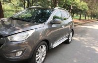 Hyundai Tucson AT 2009 - Cần bán lại xe Hyundai Tucson AT 2009, màu xám  giá 605 triệu tại Tp.HCM