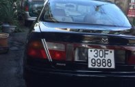 Mazda 323 2001 - Cần bán xe Mazda 323 g sản xuất năm 2001, màu đen, xe nhập giá 120 triệu tại Hà Nam