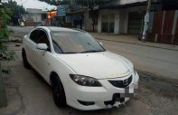 Mazda 3 2004 - Cần bán lại xe Mazda 3 2004, màu trắng, nhập khẩu nguyên chiếc  giá 245 triệu tại Đồng Tháp