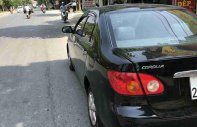 Toyota Corolla altis G 2003 - Bán Toyota Corolla altis G sản xuất 2003, màu đen giá 175 triệu tại Bình Định