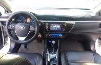 Toyota Corolla altis 1.8G CVT 2014 - Cần bán Toyota Corolla Altis 1.8G CVT sản xuất 2014, màu trắng giá 630 triệu tại Vĩnh Long