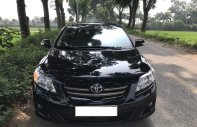 Toyota Corolla altis G 2009 - Cần bán gấp Toyota Altis 2009 số sàn, màu đen giá 412 triệu tại Tp.HCM