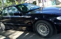 BMW 3 Series 320i 1997 - Cần bán BMW 320i 1997, màu đen, xe nhập giá 140 triệu tại Kon Tum