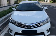 Toyota Corolla altis 1.8 G 2015 - Bán xe Toyota Corolla altis 1.8 G đời 2015, màu trắng số tự động giá 660 triệu tại Hậu Giang