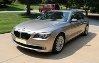 BMW 7 Series 750Li 2011 - Cần bán xe BMW 750Li 2011 màu vàng kim giá 1 tỷ 148 tr tại Tp.HCM