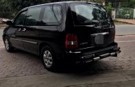 Kia Carnival 2006 - Cần bán lại xe Kia Carnival năm 2006 màu đen, giá tốt nhập khẩu giá 220 triệu tại Quảng Ngãi