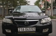 Mazda 323   2005 - Bán ô tô Mazda 323 đời 2005, màu đen, xe nhập, 142tr giá 142 triệu tại Hà Nội
